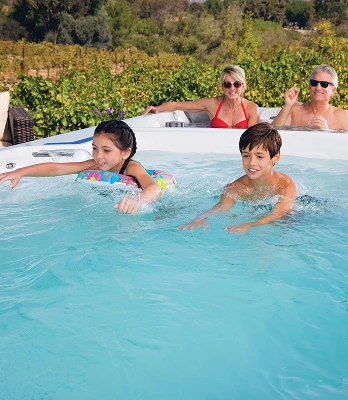 20-foot dual-temperature Endless Pools swim spa backyard installation