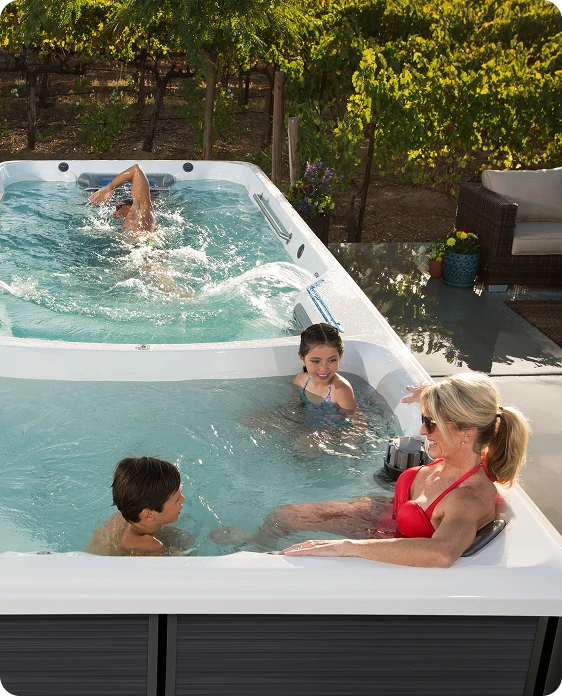 Dual-temperature swim spa hot tub zone with 36 hydrotherapy jets