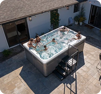 R-Series swim spa compared to hot tubs