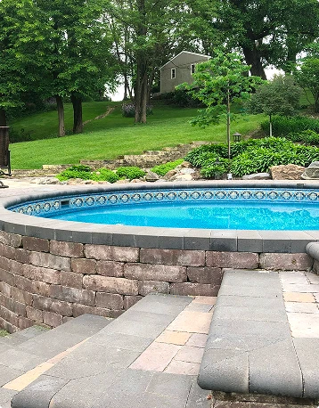 Semi-Inground Pool built into a sloped backyard